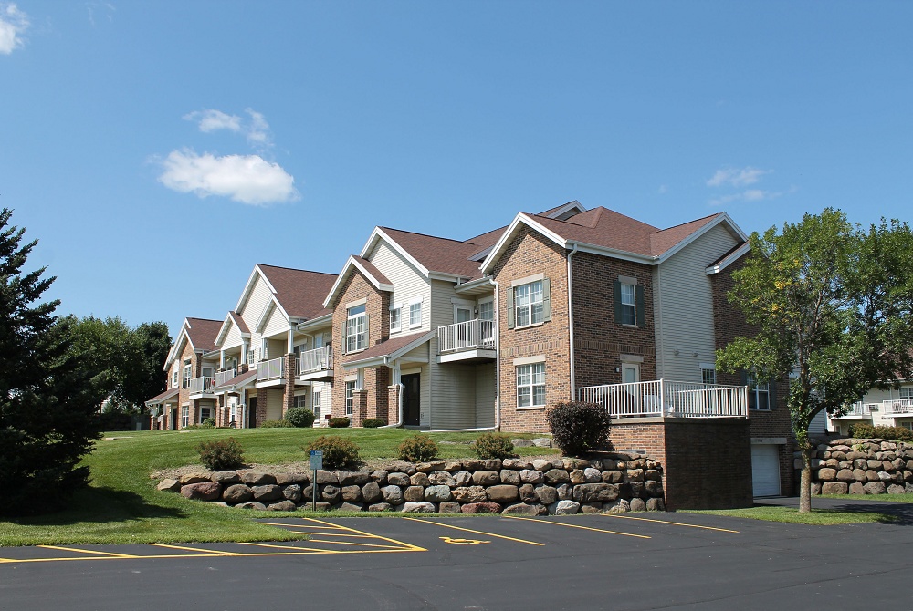 Parking lot and apartment building