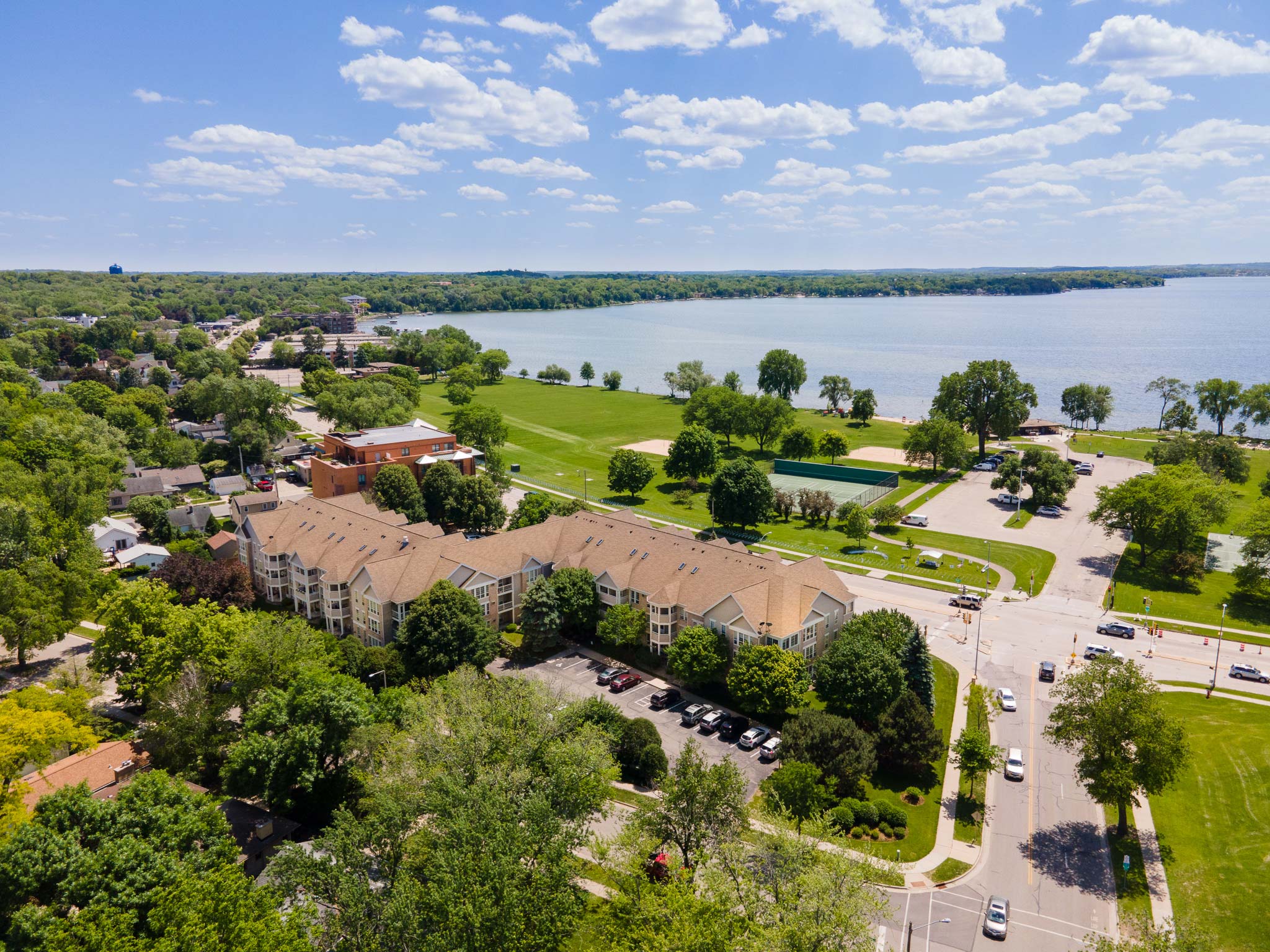 Aerial shot of Olbrich by the Lake apartment building with Lake Monona in the background