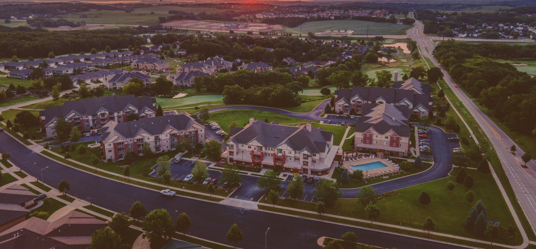 An aerial shot of Rouse property at Hawks Landing at sunset on a summer day